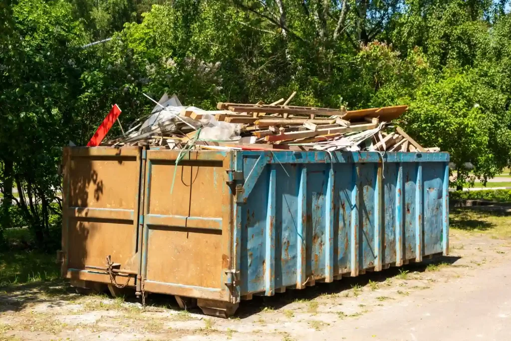 A skip with rubbish in it to show property clearance services that RSM Property Solutions provides.